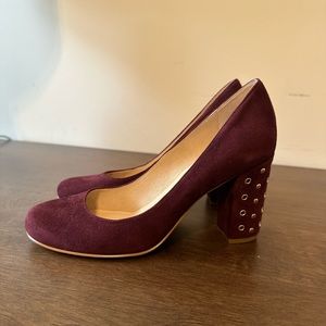 Kate Spade burgundy suede grommet heel pump.